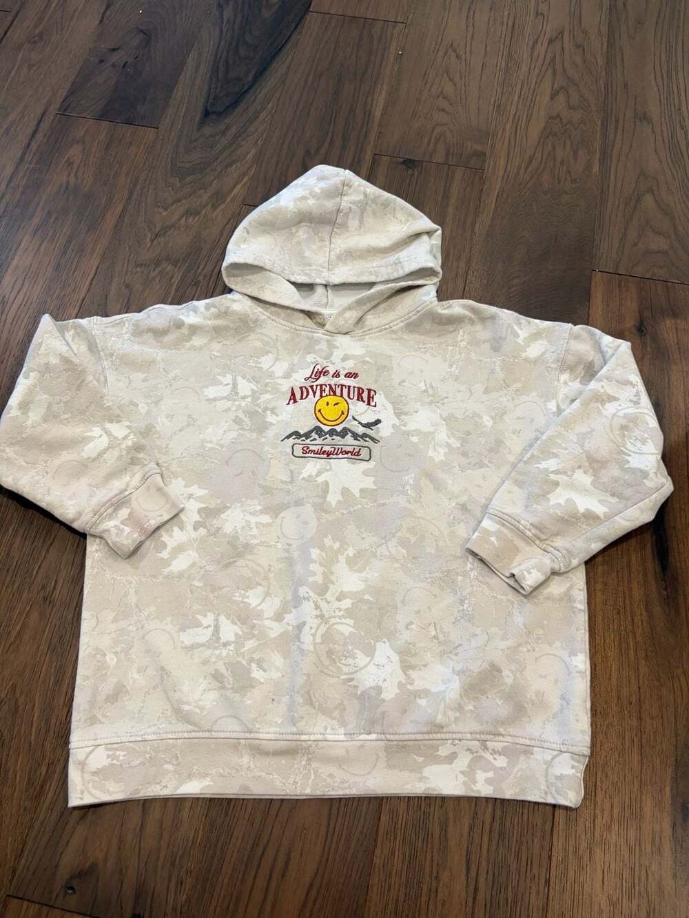 SmileyWorld Life is an Adventure Embroidered Graphic Cream Camo Hoodie